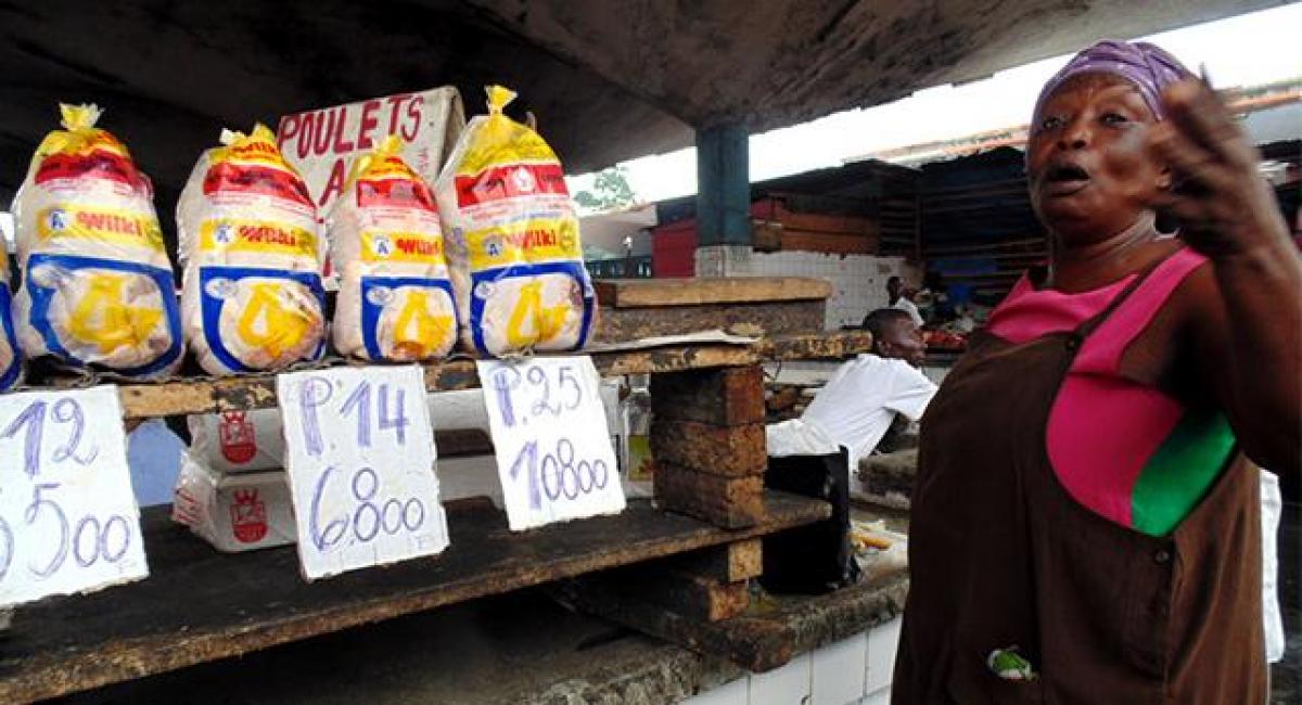 Vendeuse de poulet à Kinshasa